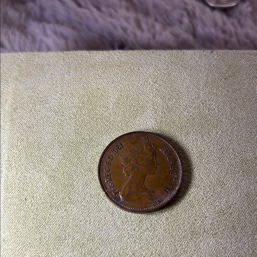 Vintage Coin with Queen's Profile
